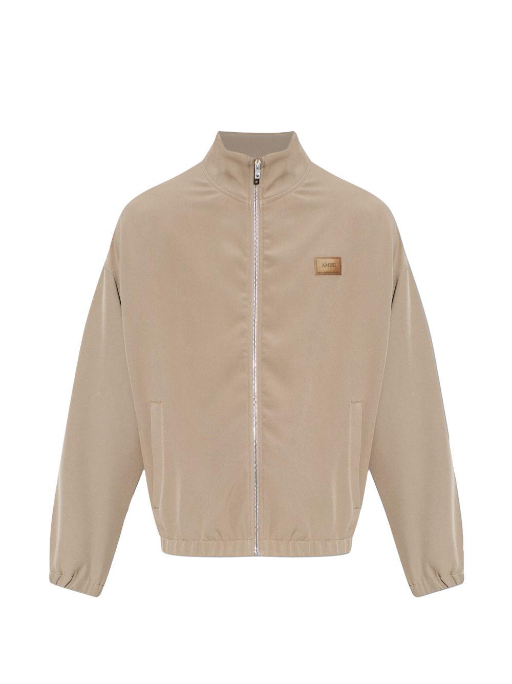 PATCH CADY TRACK JKT AMOUJA1135 DARK SAND AMIRI