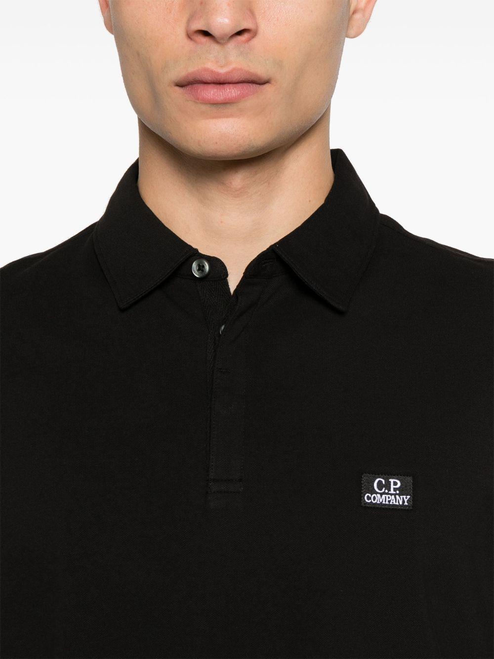 Strech Piquet Three-button Logo Polo 18CMPL165A005263W 999 BLACK CP COMPANY