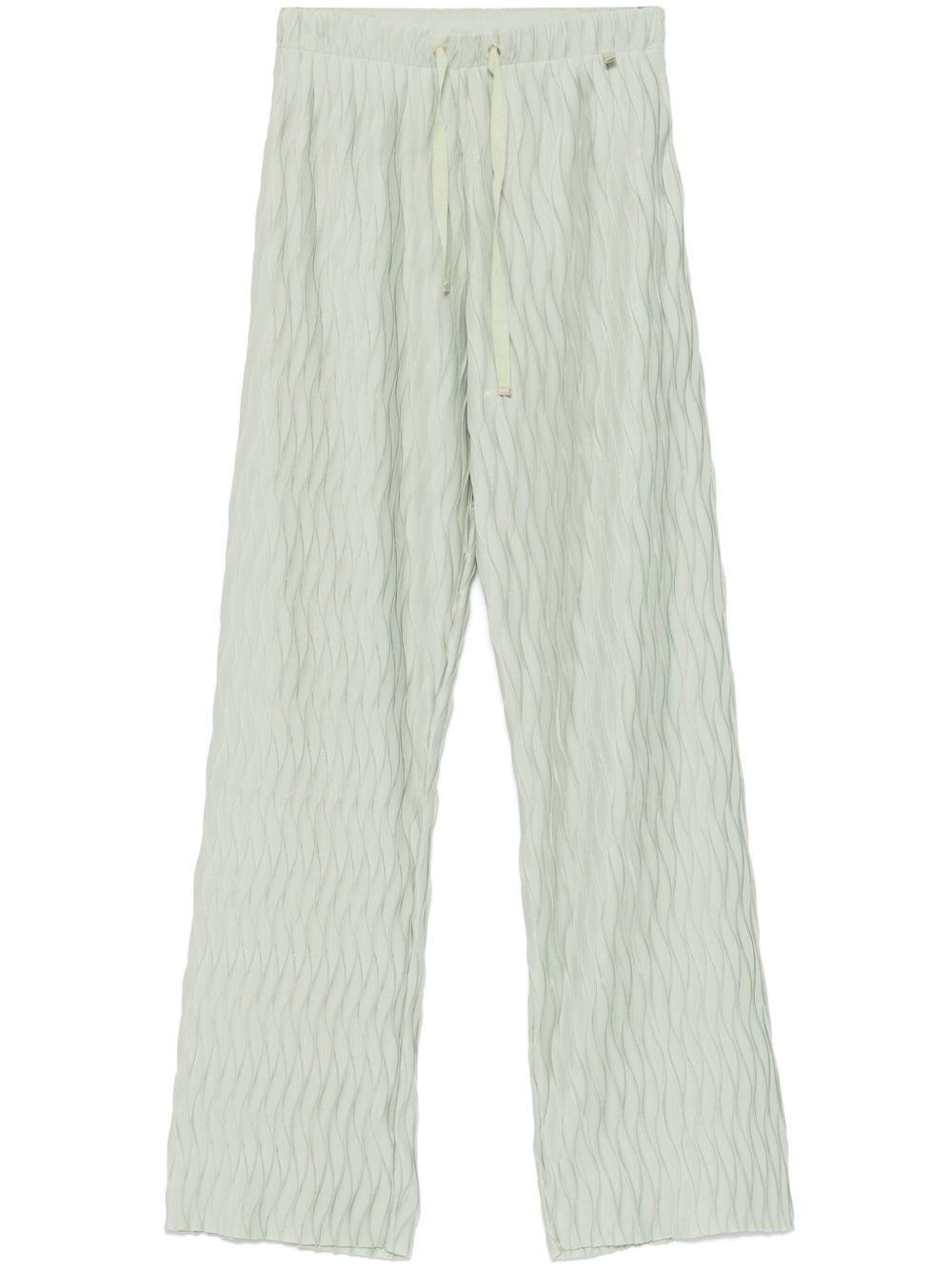 Pantaloni con effetto stropicciato PT000118D52102 7109 VERDE CHIARO HERNO