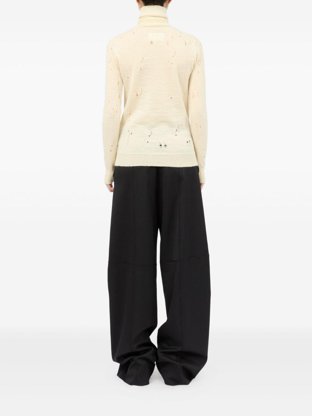 Dolcevita in lana con dettagli effetto usurato S52HA0299M13134 103 CREAM MM6 MAISON MARGIELA