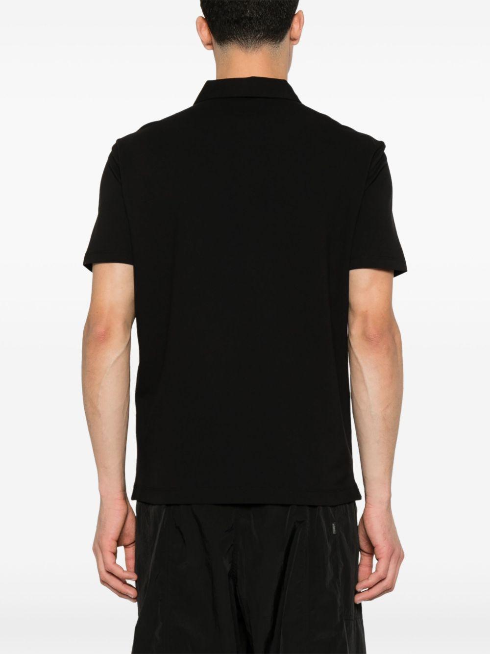 Strech Piquet Three-button Logo Polo 18CMPL165A005263W 999 BLACK CP COMPANY