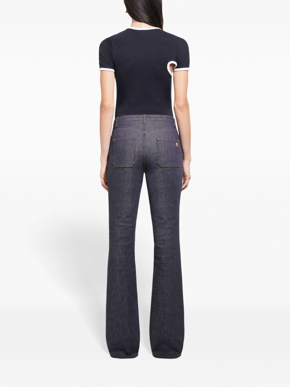  424JTS157JS0070 9901 BLACK HERITAGE WHITE COURREGES 