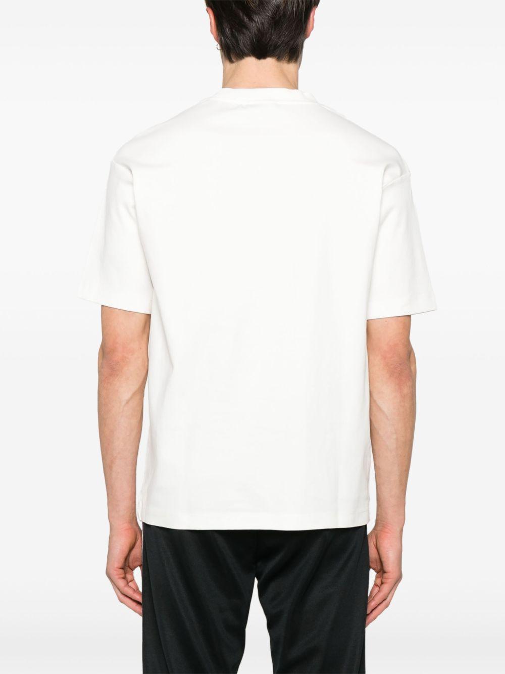 Le T-Shirt Tennis Court GTS246CO002 OFF WHITE DROLE DE MONSIEUR 