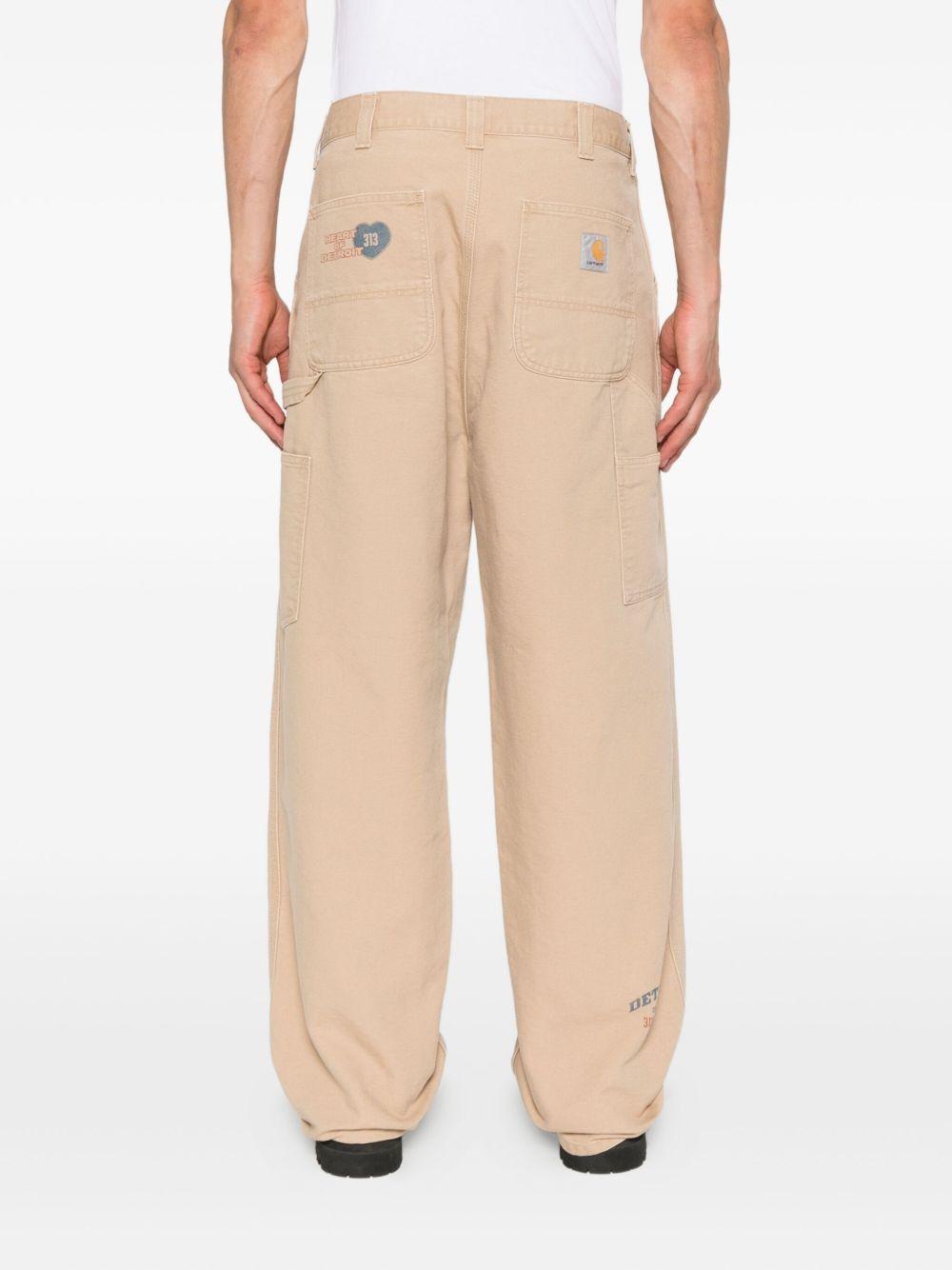 OG Single Knee Graphic Pant I035560 07E60 DUSTY BROWN CARHARTT WIP 
