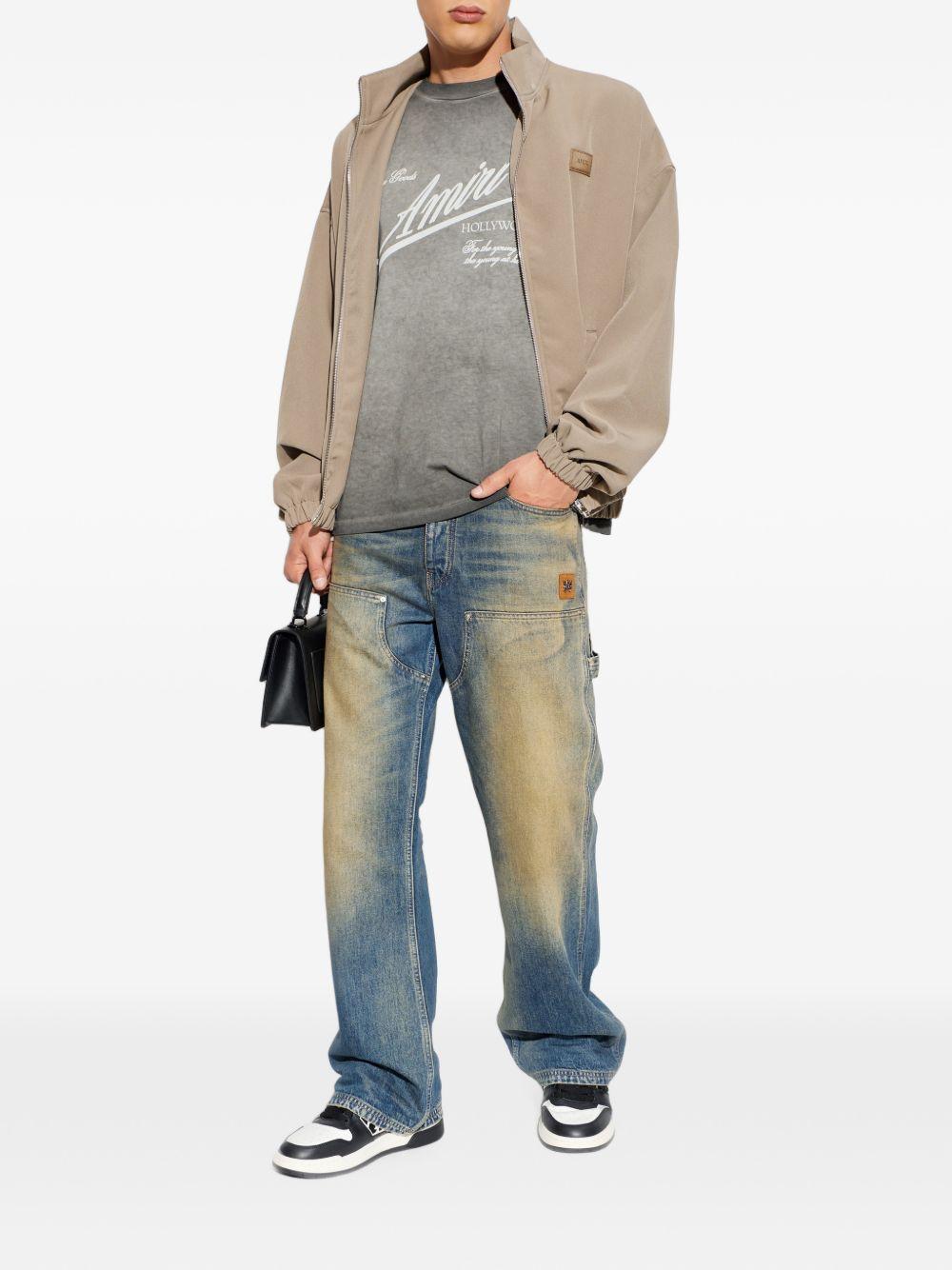 PATCH CADY TRACK JKT AMOUJA1135 DARK SAND AMIRI 