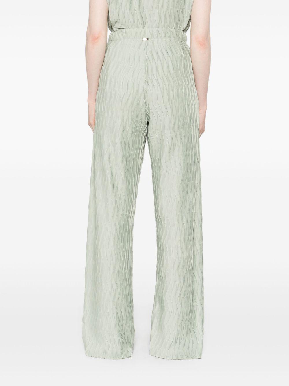 Pantaloni con effetto stropicciato PT000118D52102 7109 VERDE CHIARO HERNO 