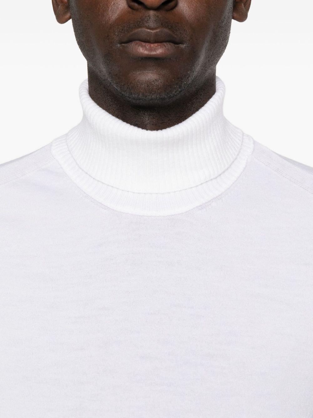Extrafine Merino Wool Turtleneck Sweater 19CMKN035A005528A 103 GAUZE WHITE CP COMPANY 