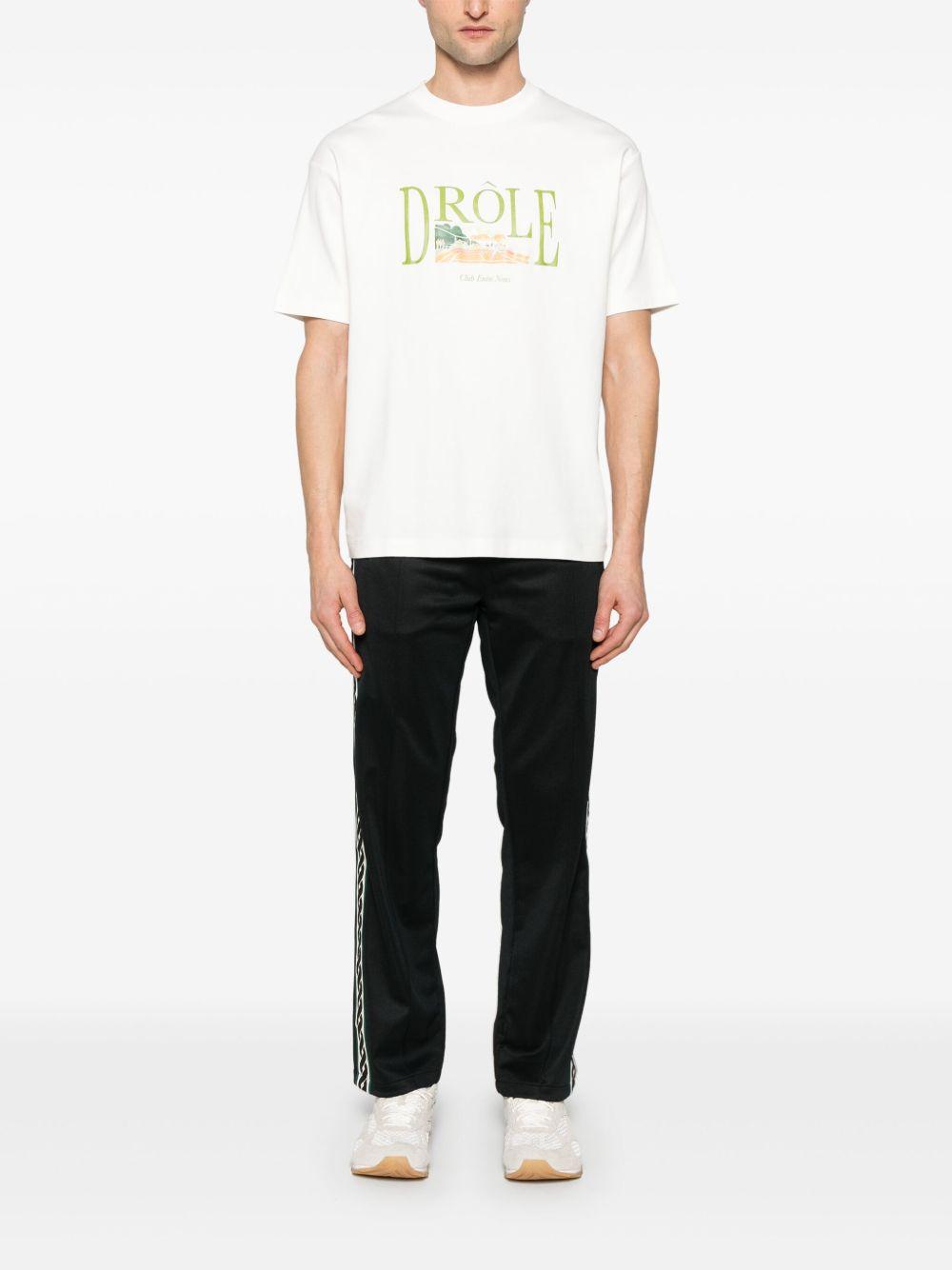 Le T-Shirt Tennis Court GTS246CO002 OFF WHITE DROLE DE MONSIEUR 