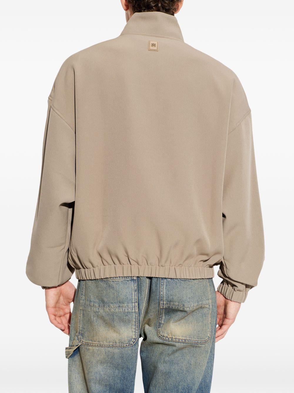 PATCH CADY TRACK JKT AMOUJA1135 DARK SAND AMIRI 
